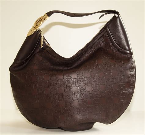 gucci linea a hobo embossed leather shoulder bag|gucci hobo bag vintage.